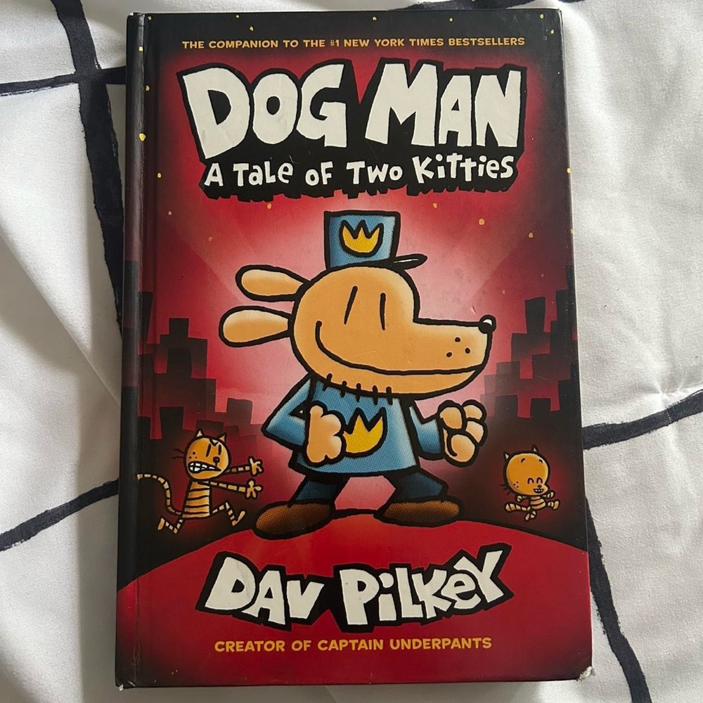 Dog Man: A Tale of Two Kitties by - Red and Black Cover